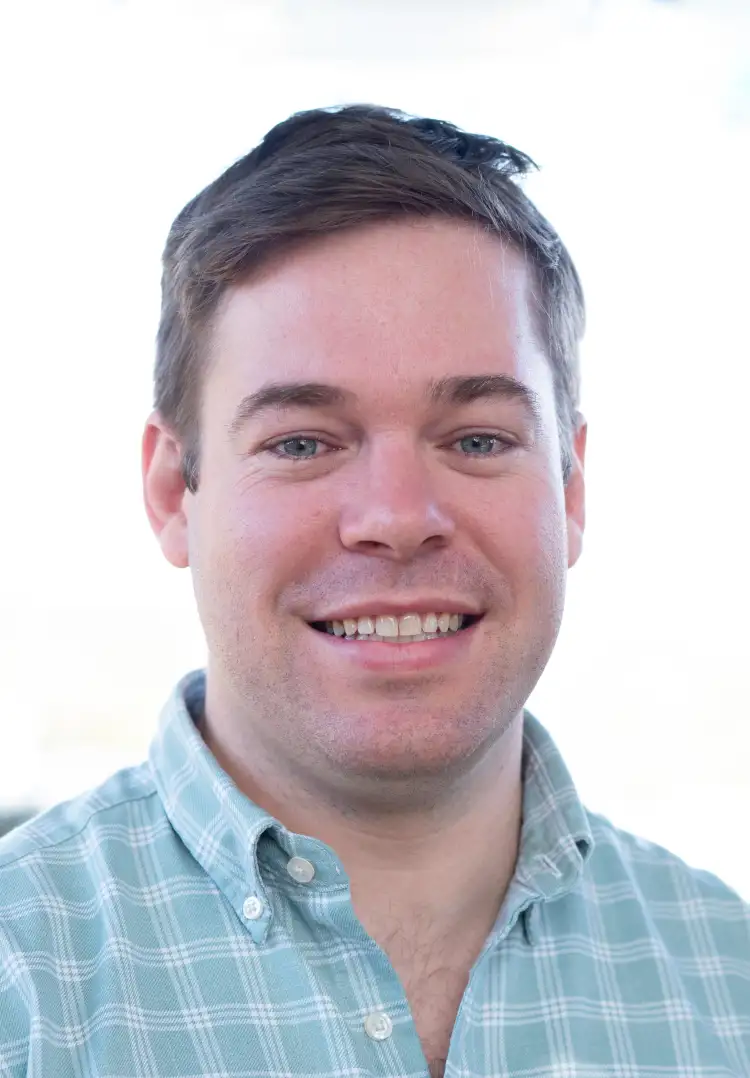 Dr. Angus McGinness